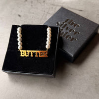 Collier en perles de faux beurre perlé nourriture boulangerie gourmet