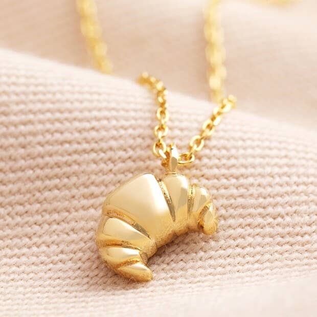 Collier avec pendentif en forme de croissant en or