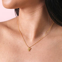 Collier avec pendentif en forme de croissant en or
