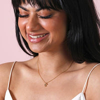 Collier avec pendentif en forme de croissant en or
